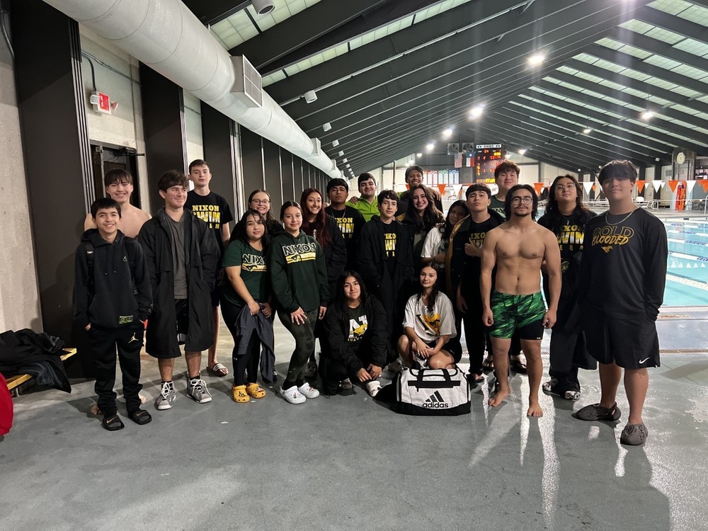 NHS boys swim team breaks  record