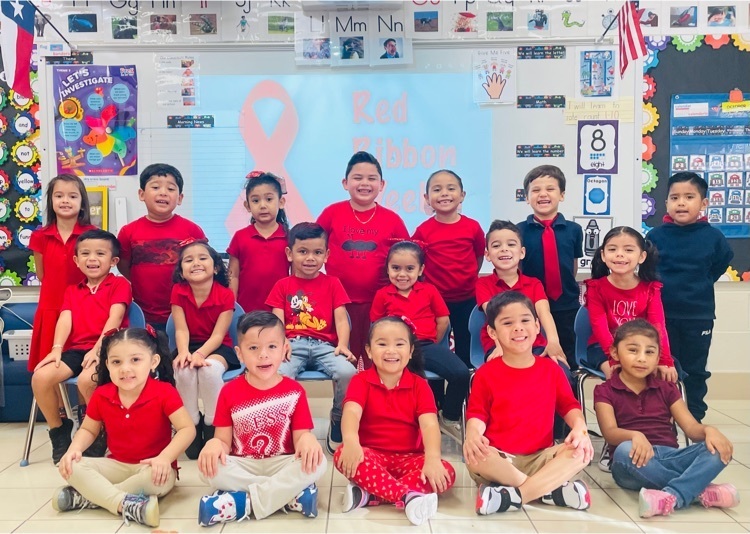 Mrs. Mar’s PK-4 class celebrates the beginning of Red Ribbon Week by wearing red.