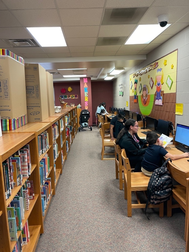 Parents and students take advantage of the extended library hours.
